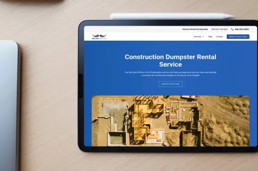 Tablet on a desk showing a dumpster rental company website designed by CL Creative