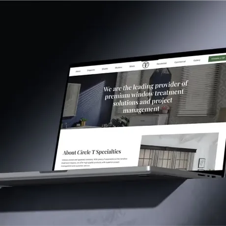 Laptop displaying the homepage of a window treatment company website
